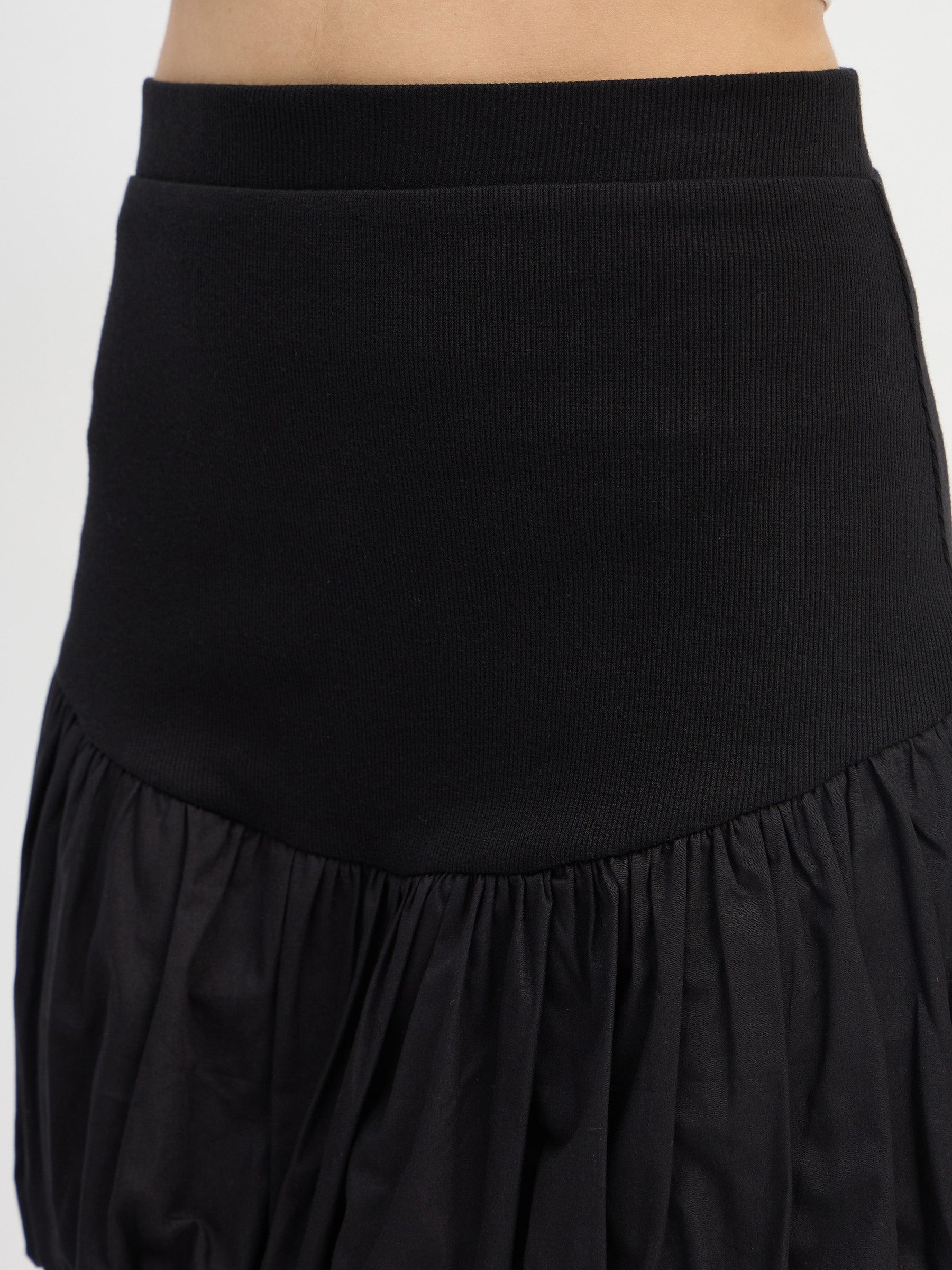 Black Rib Balloon Hem Mini Skirt-SASSAFRAS