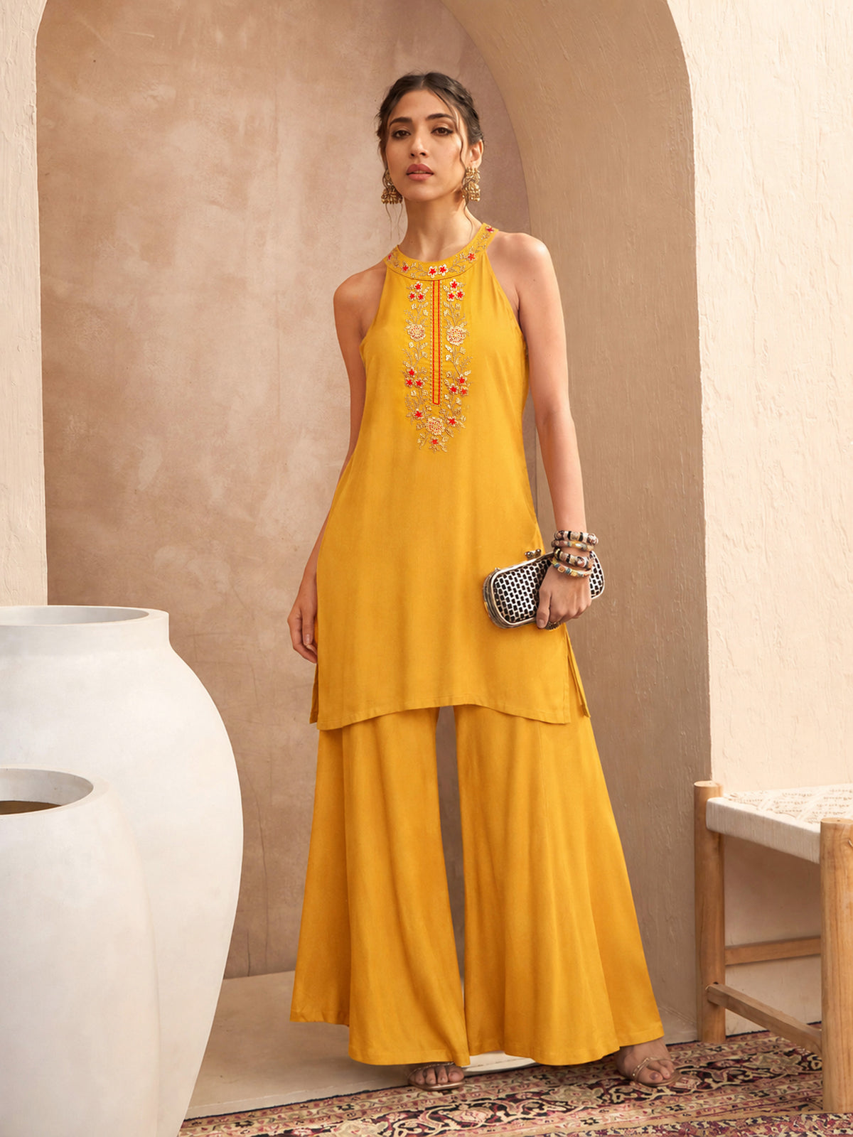 Women Mustard Embroidered Halter Kurta With Palazzos