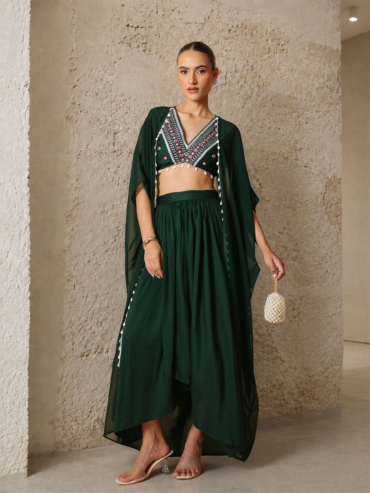 Emerald Green Embroidered Crop Top With Dhoti Skirt And Shrug-Shae by SASSAFRAS