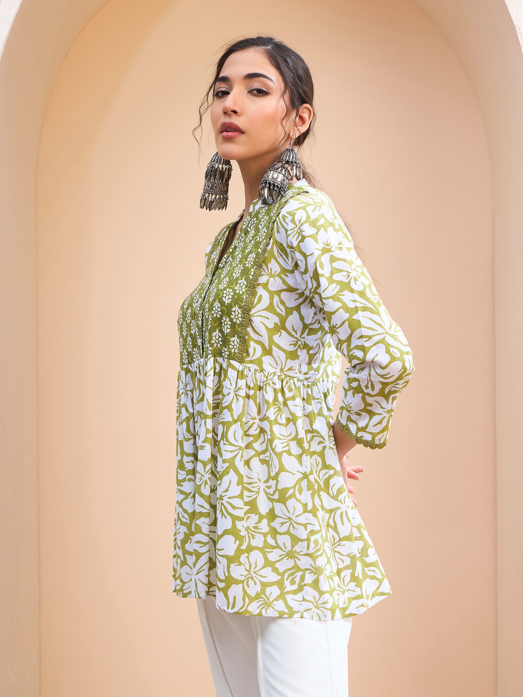 Green Floral Cambric Front Yoke Peplum Kurti -Shae by SASSAFRAS