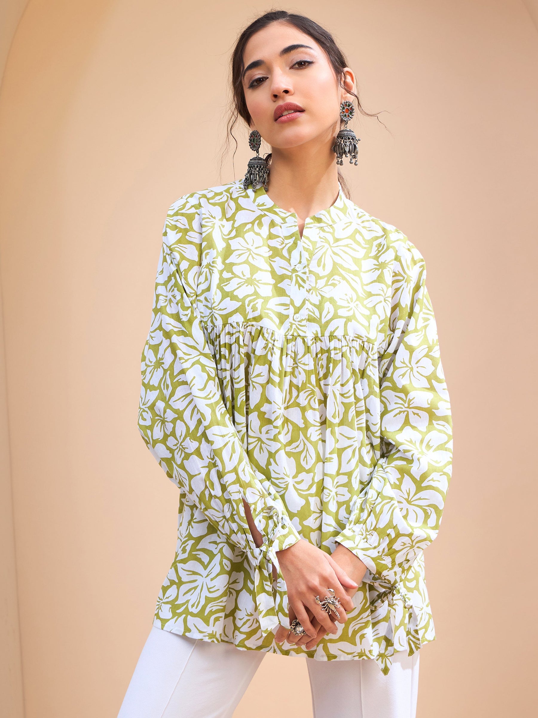 Green Floral Cambric Sleeves Knot Peplum Kurti-Shae by SASSAFRAS