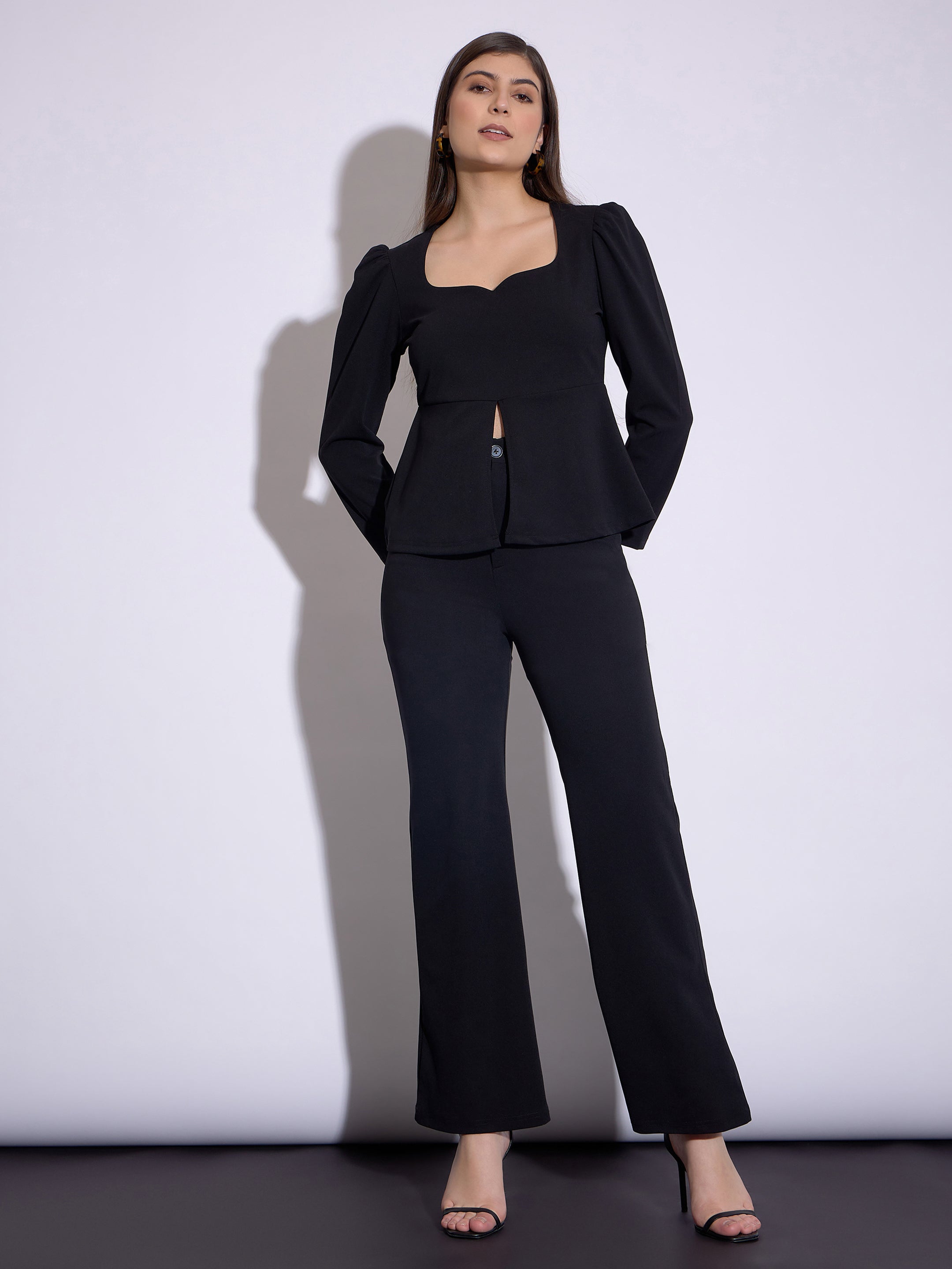 Women Black Peplum Top With Bell Bottom Pants - Main Image