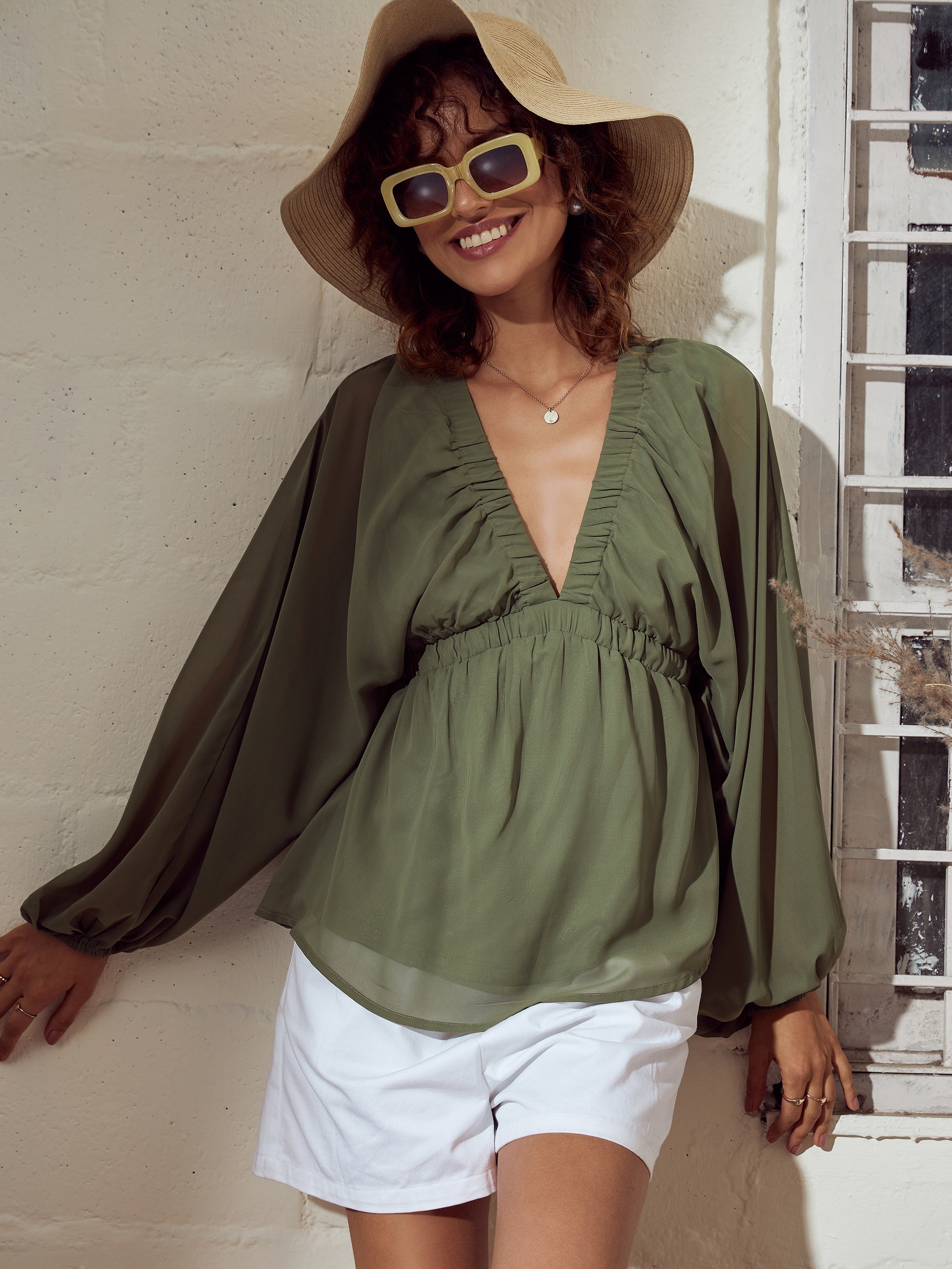 olive peplum top