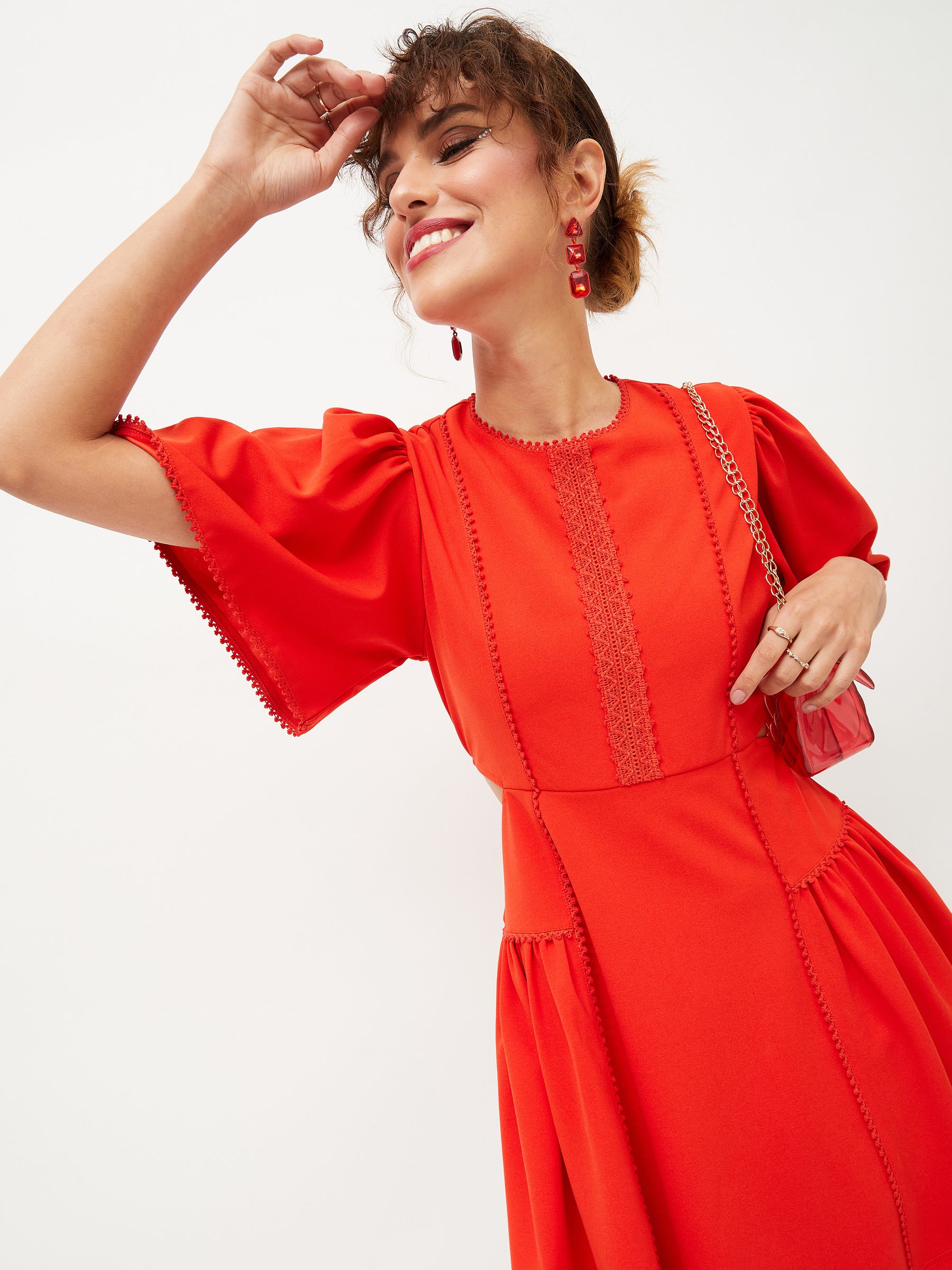 Buy Women Orange Side Cut Out Skater Dress Online at Best Price