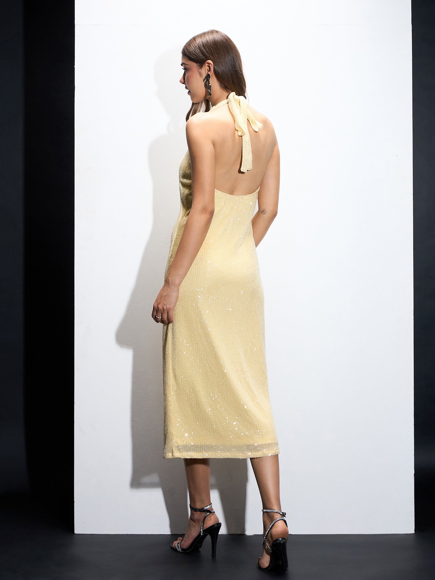 Buy Women Yellow Sequin Halter Neck Short Dress Online at Best Price - Sassafras Buy Women Yellow Sequin Halter Neck Short Dress Online at Best Price - Sassafras