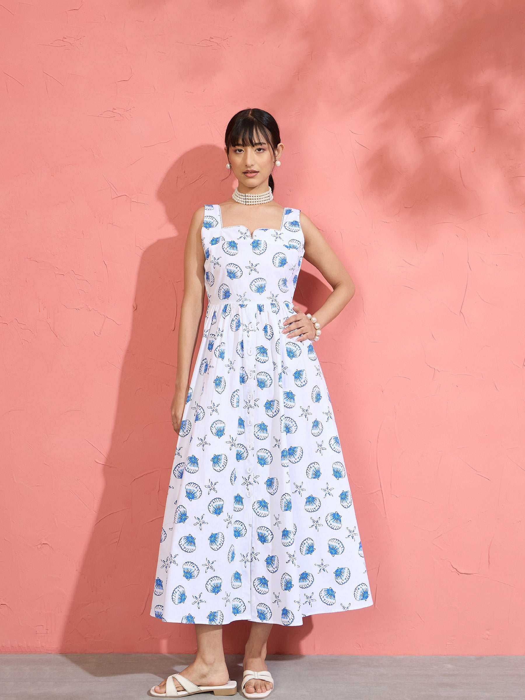 Women White & Blue Printed Sleeveless Button Down Midi Dress