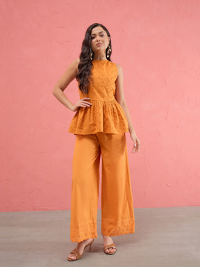 Women Rust Schiffli Sleeveless Peplum Top With Straight Pants