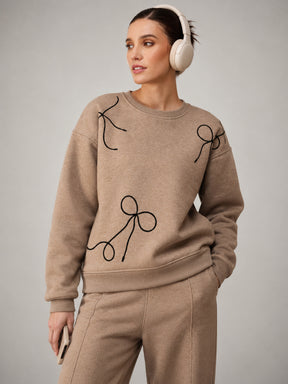 Beige Melange Fleece Bow Placement Print Oversize Sweatshirt-SASSAFRAS