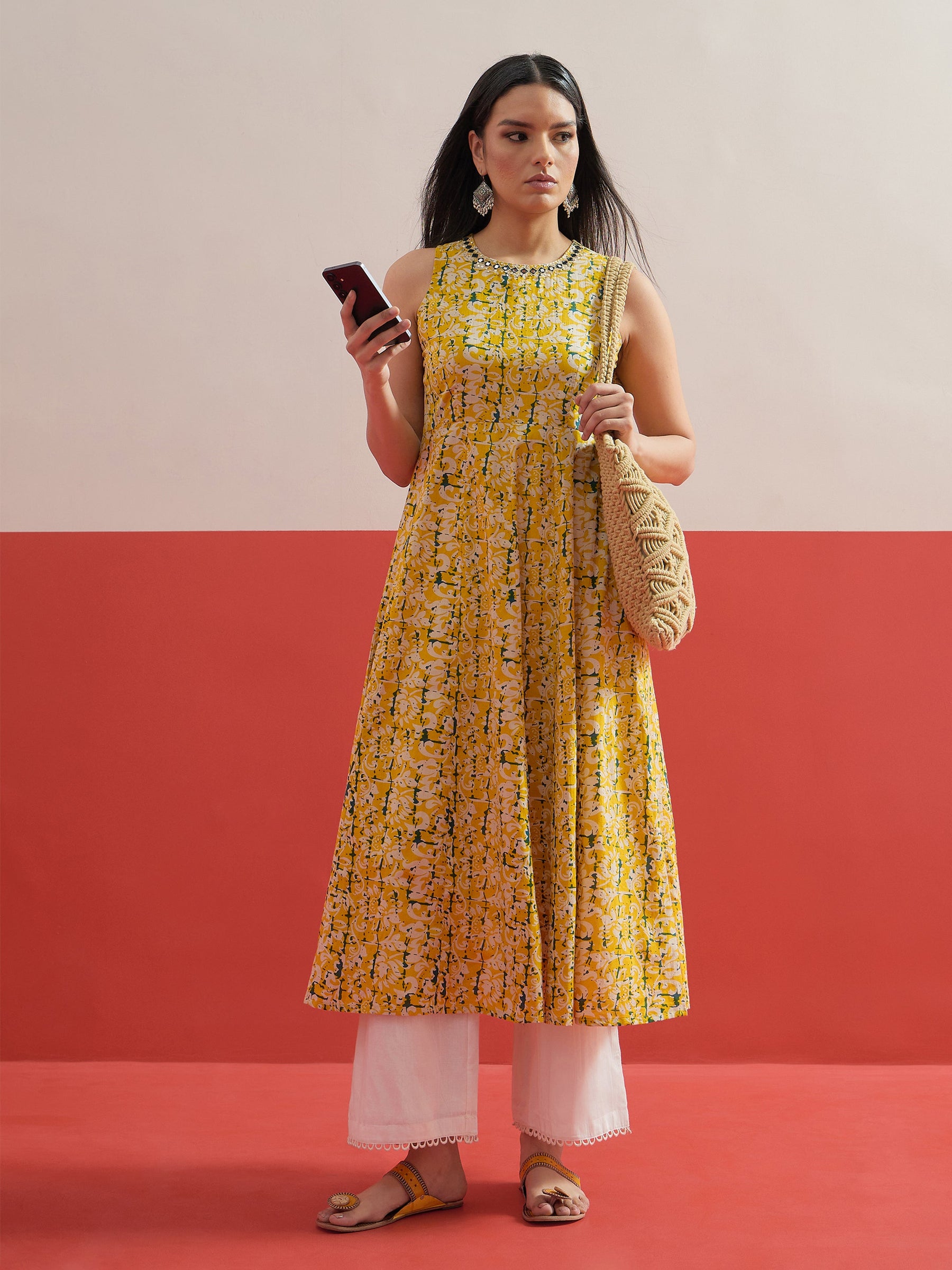 Yellow Floral Embroidered Sleeveless Kurta With Straight Pant -Shae by SASSAFRAS