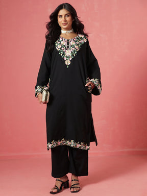 Black Woollen Embroidered Pheran Kurta-Shae by SASSAFRAS