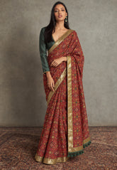 Maroon Patola Saree With Green Unstitched Blouse-Shae by SASSAFRAS
