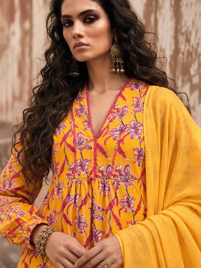 Women Yellow Floral Cambric V Neck Kurta With Pencil Pants & Dupatta