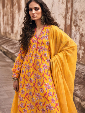 Women Yellow Floral Cambric V Neck Kurta With Pencil Pants & Dupatta
