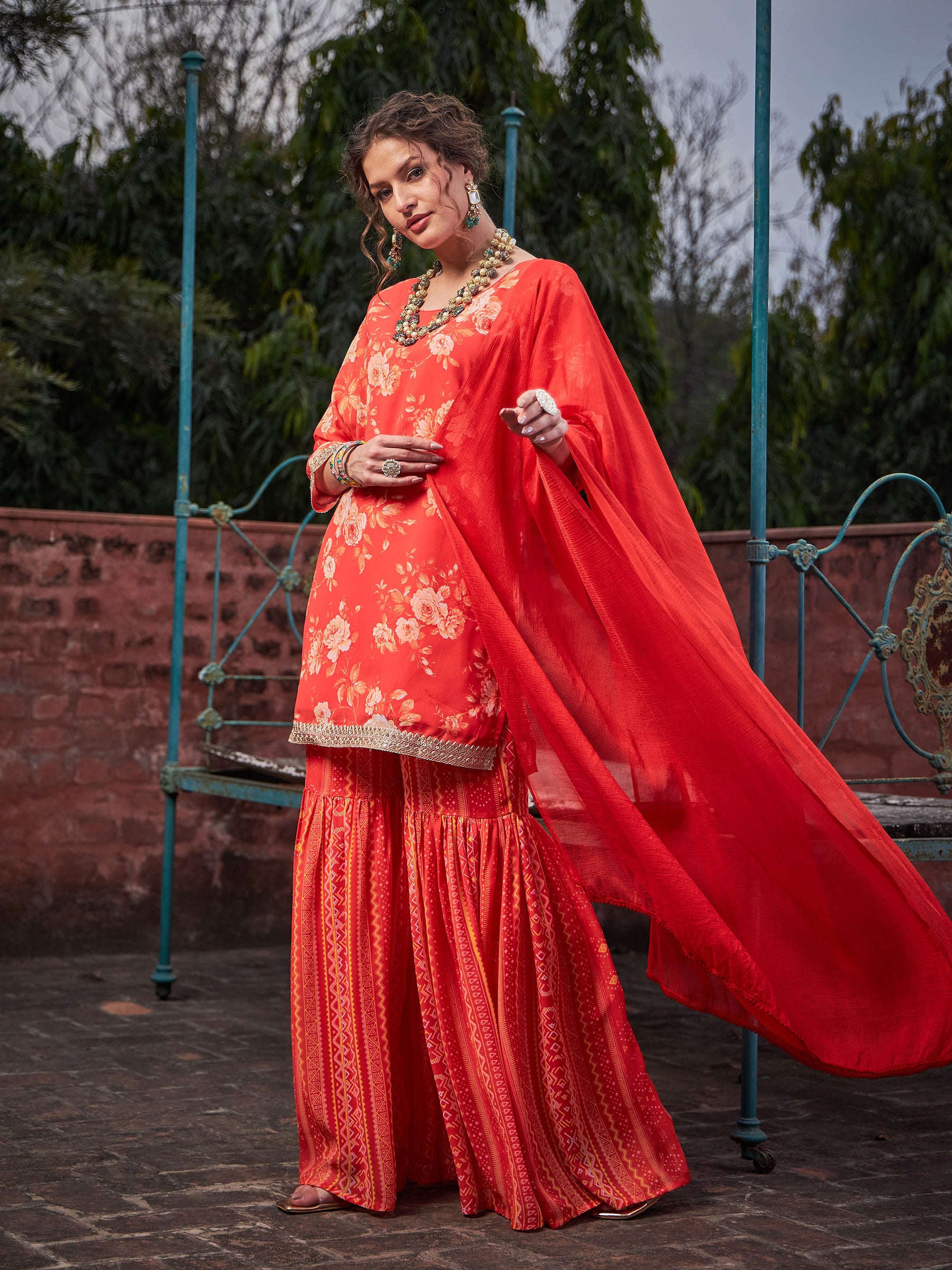 Orange Floral Short Kurta With Sharara Pants & Dupatta-Shae by SASSAFRAS