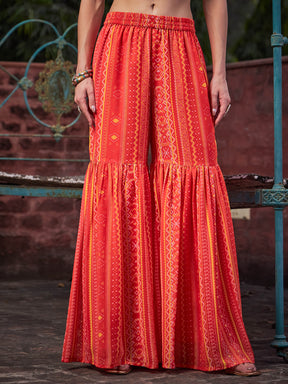 Orange Floral Short Kurta With Sharara Pants & Dupatta-Shae by SASSAFRAS