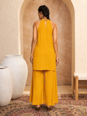 Women Mustard Embroidered Halter Kurta With Palazzos