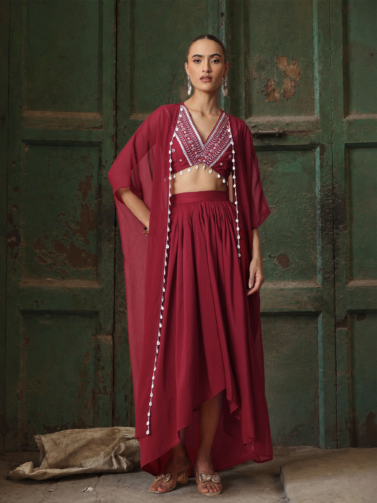 Maroon Embroidered Crop Top With Dhoti Skirt And Shrug-Shae by SASSAFRAS