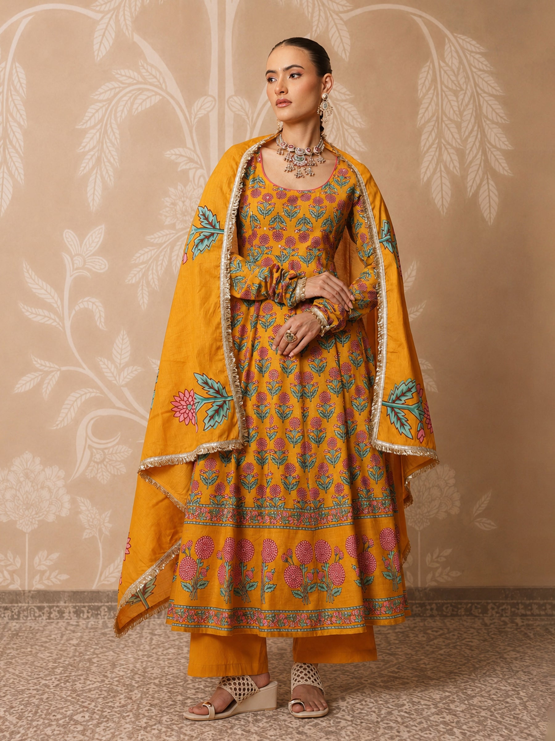 Women Yellow Floral Cotton Anarkali Kurta With Pencil Pants & Dupatta
