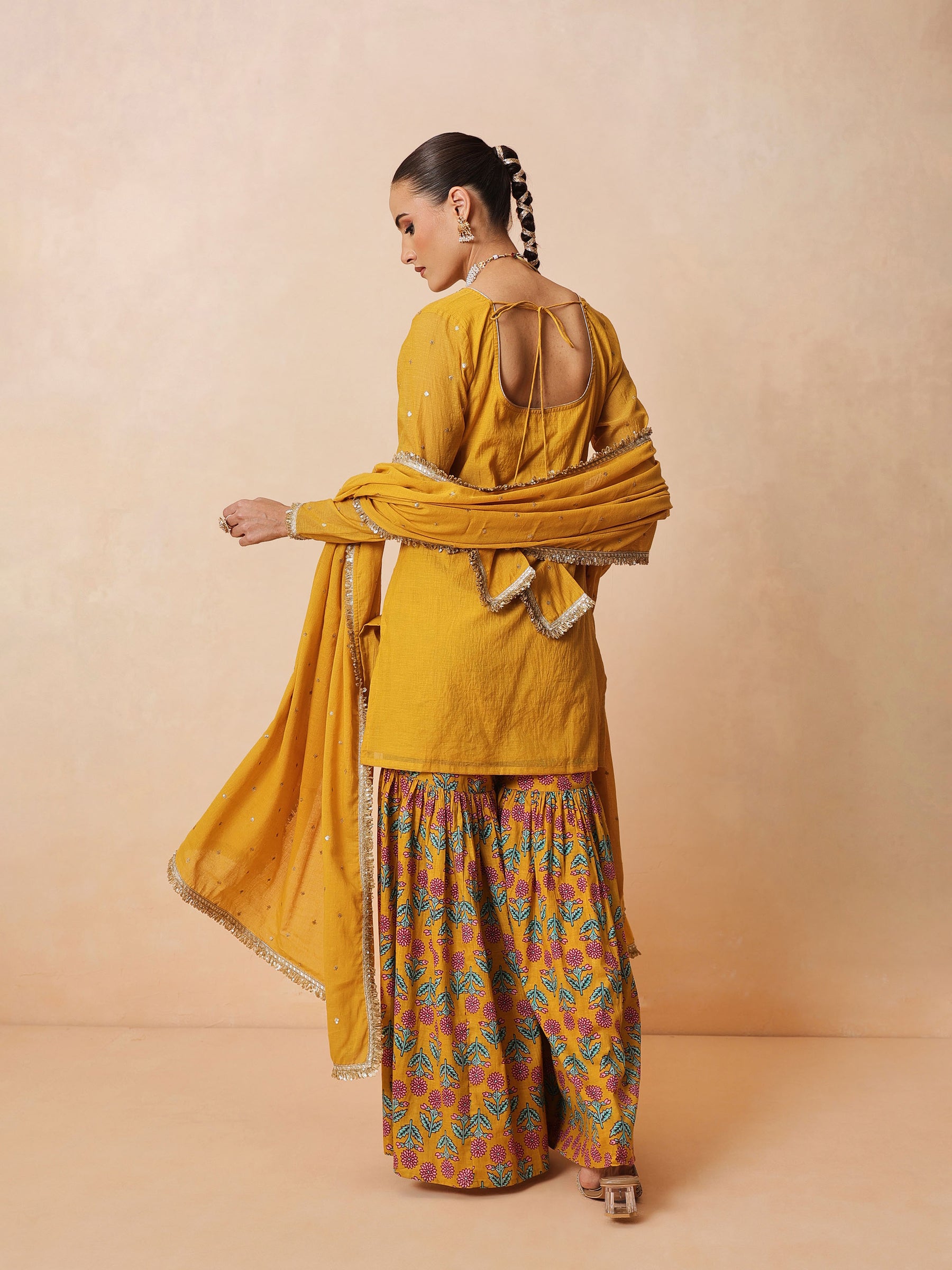 Women Yellow Embroidered Short Kurta With Sharara Pants & Dupatta