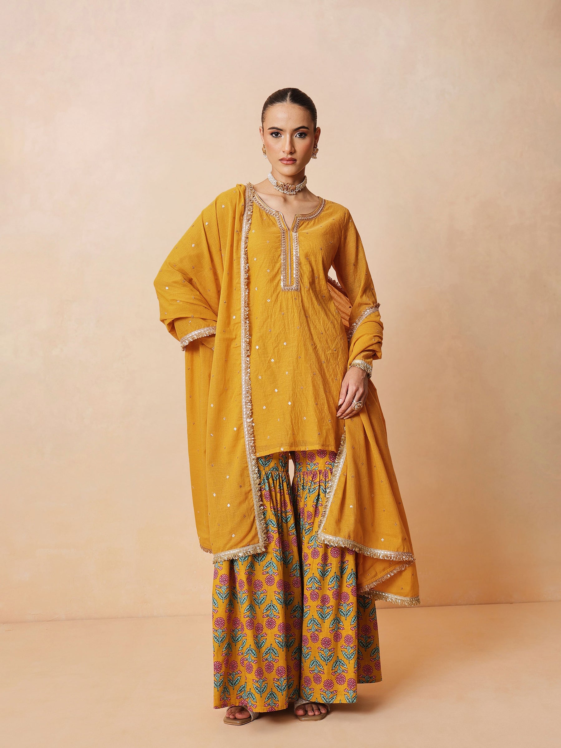 Women Yellow Embroidered Short Kurta With Sharara Pants & Dupatta