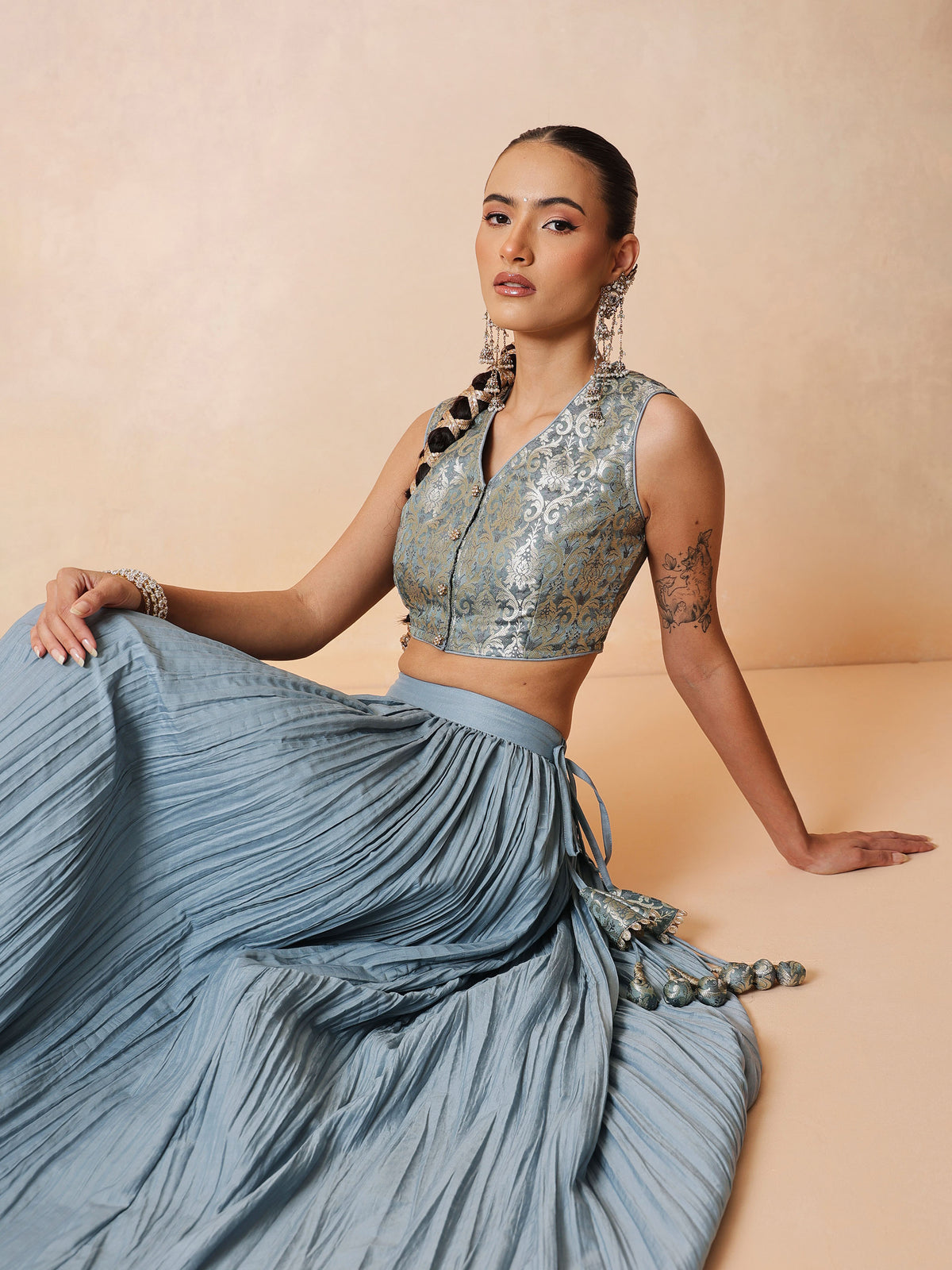 Women Powder Blue Brocade Sleeveless Crop Top With Pleated Skirt
