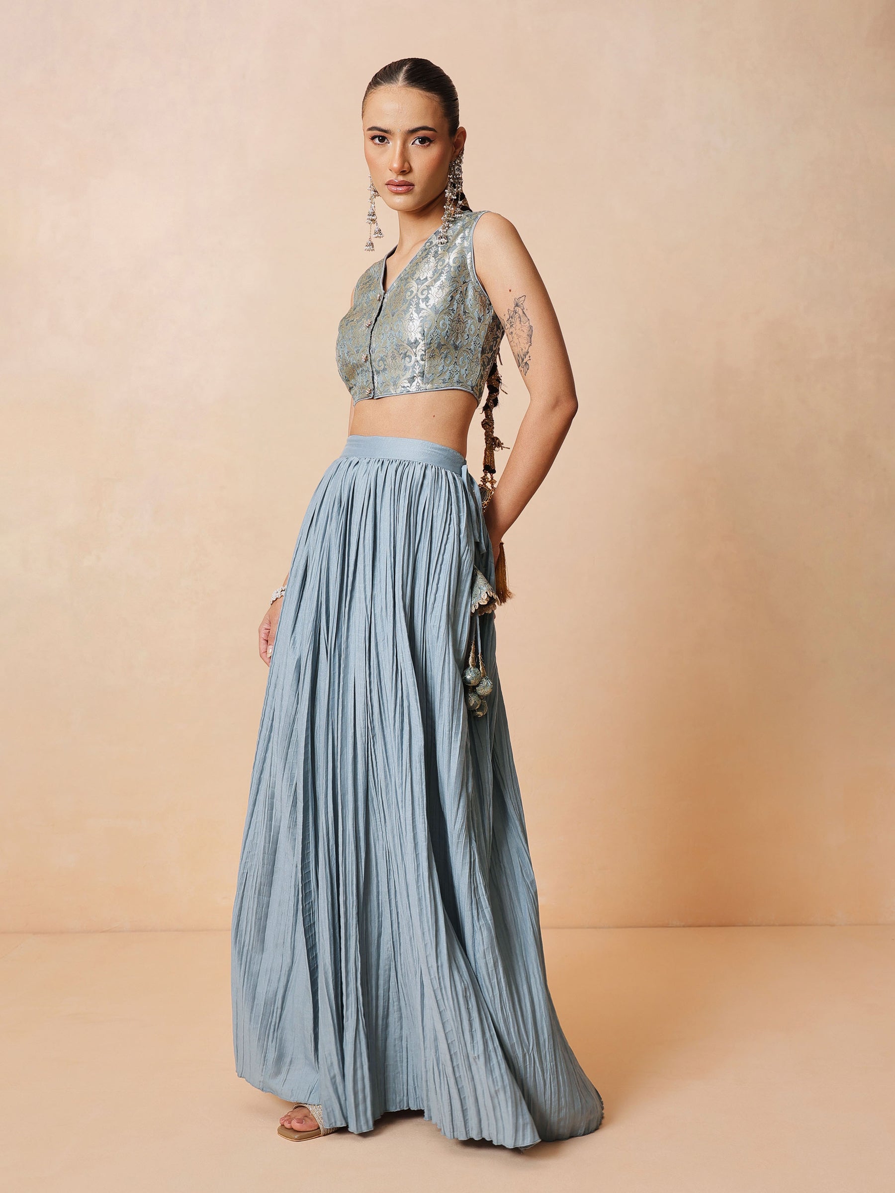 Women Powder Blue Brocade Sleeveless Crop Top With Pleated Skirt