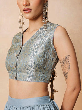 Women Powder Blue Brocade Sleeveless Crop Top With Pleated Skirt