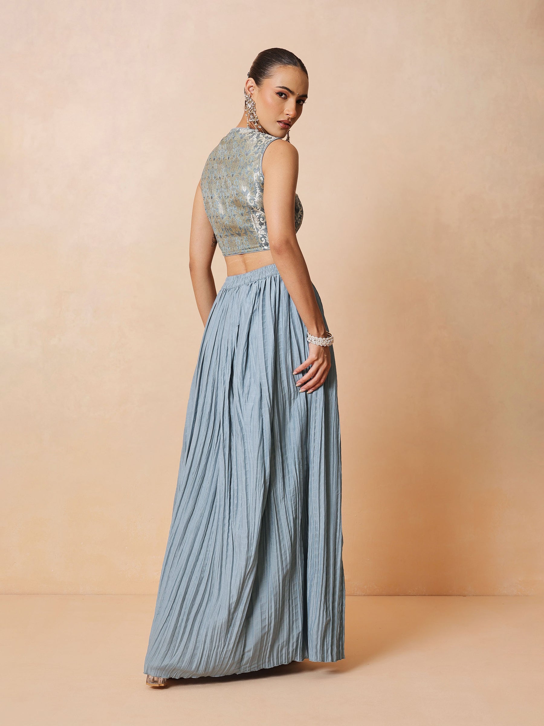 Women Powder Blue Brocade Sleeveless Crop Top With Pleated Skirt