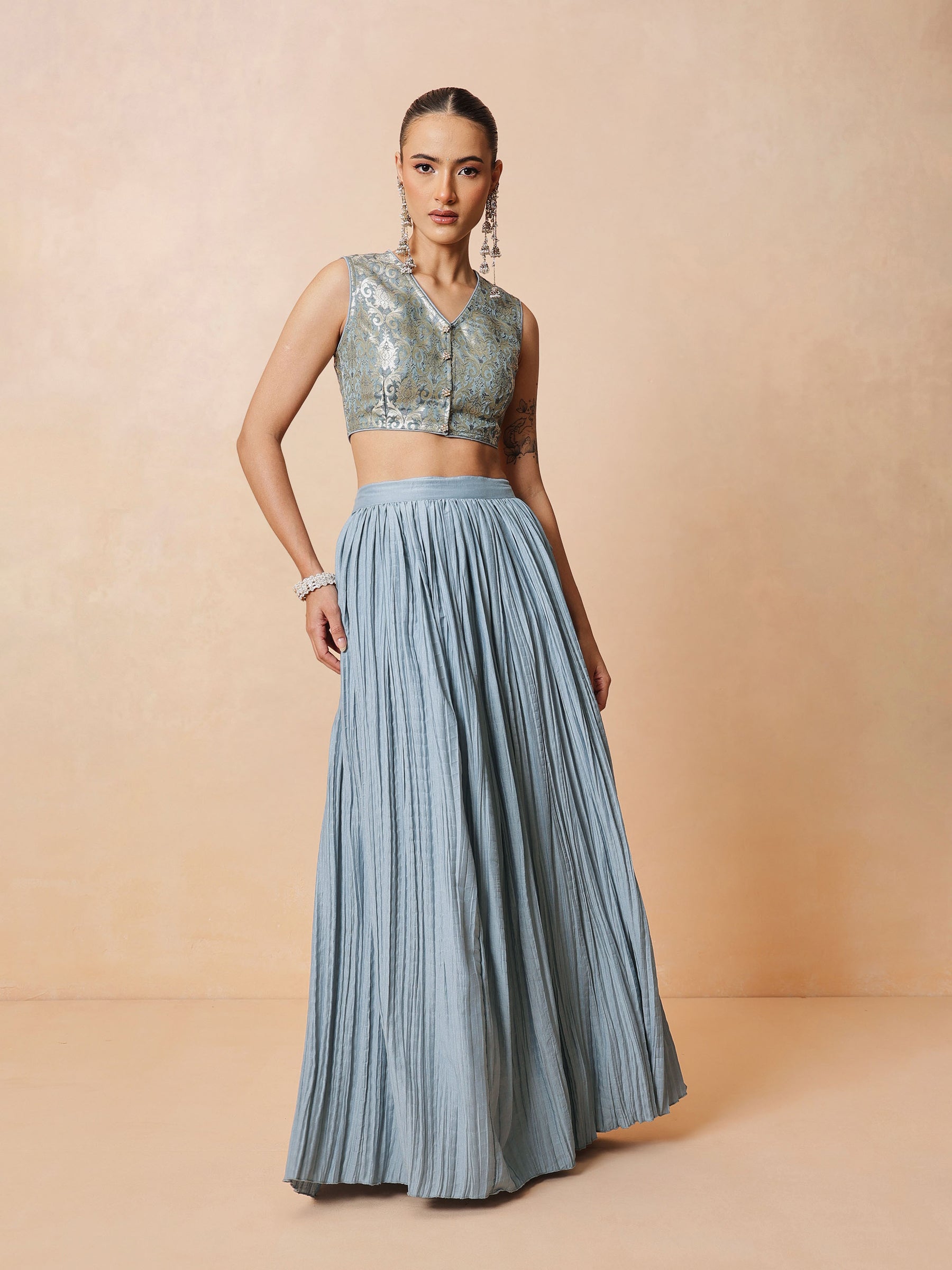 Women Powder Blue Brocade Sleeveless Crop Top With Pleated Skirt