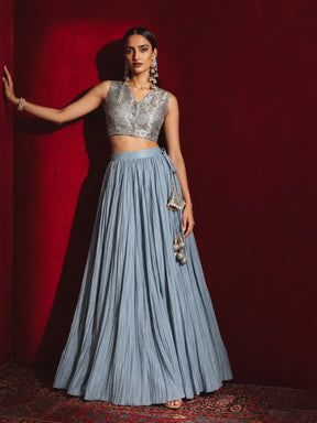 Powder Blue Brocade Sleeveless Crop Top With Pleated Skirt -Shae by SASSAFRAS
