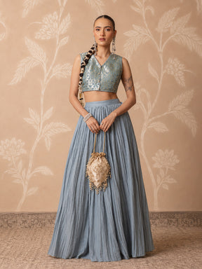 Women Powder Blue Brocade Sleeveless Crop Top With Pleated Skirt