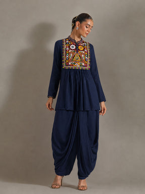 Navy Embroidered Peplum Top With Dhoti Skirt-Shae by SASSAFRAS