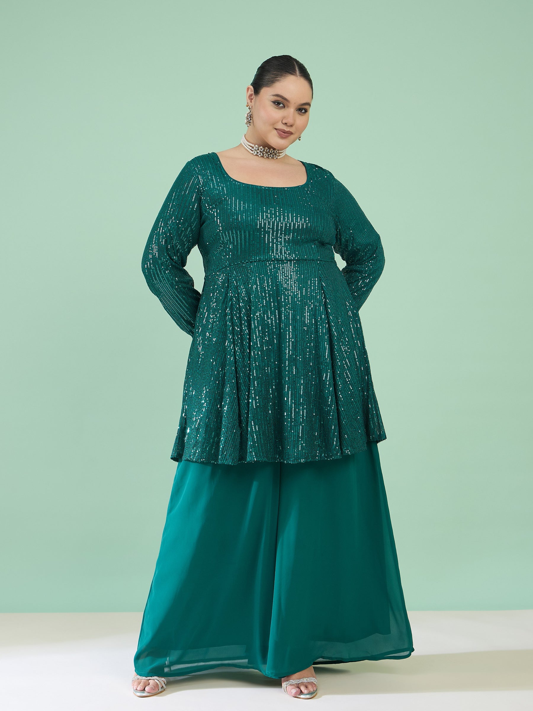 Green Sequin Full Sleeves Peplum Top With Flared Pants -Shae by SASSAFRAS