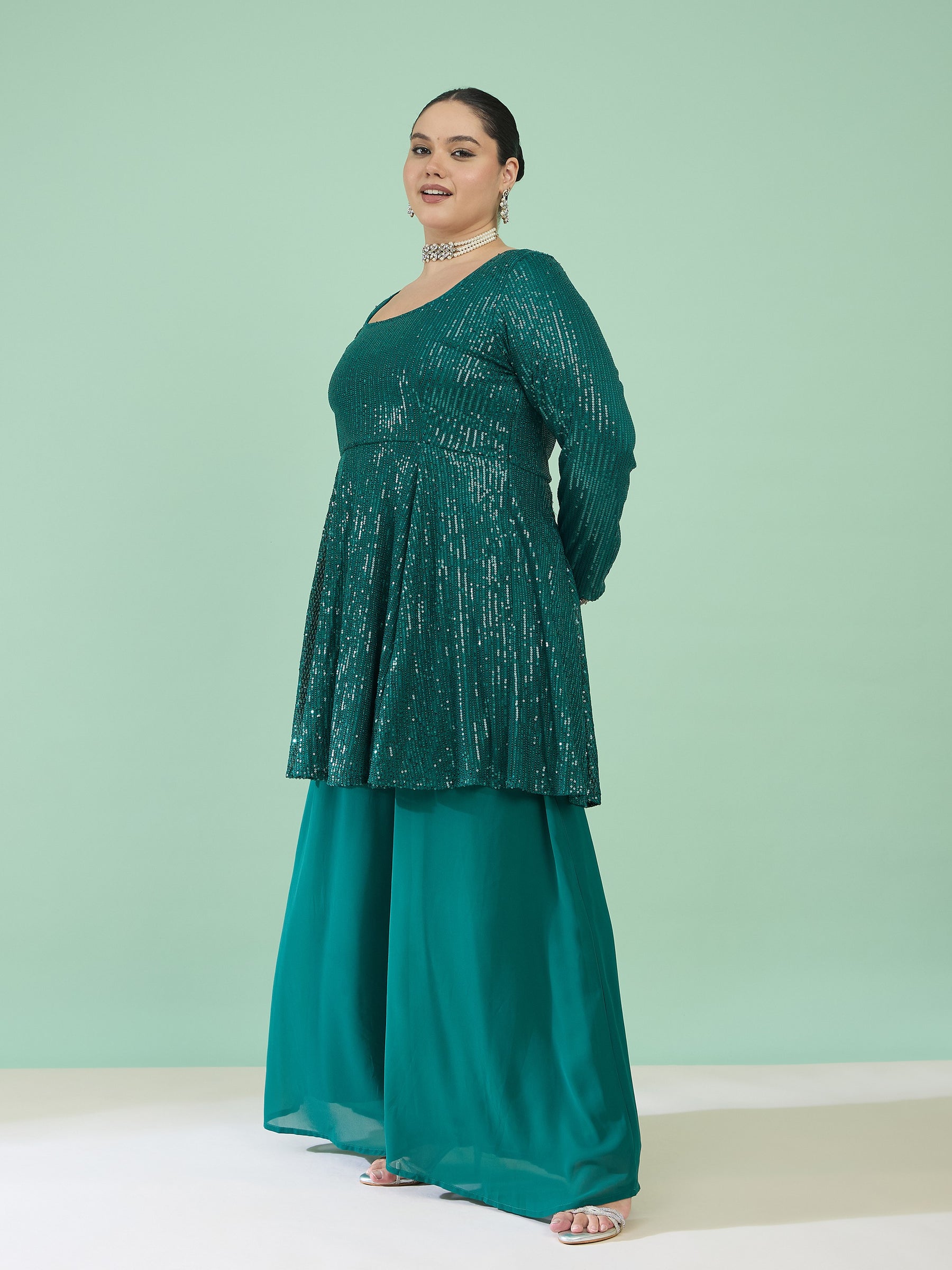 Green Sequin Full Sleeves Peplum Top With Flared Pants -Shae by SASSAFRAS