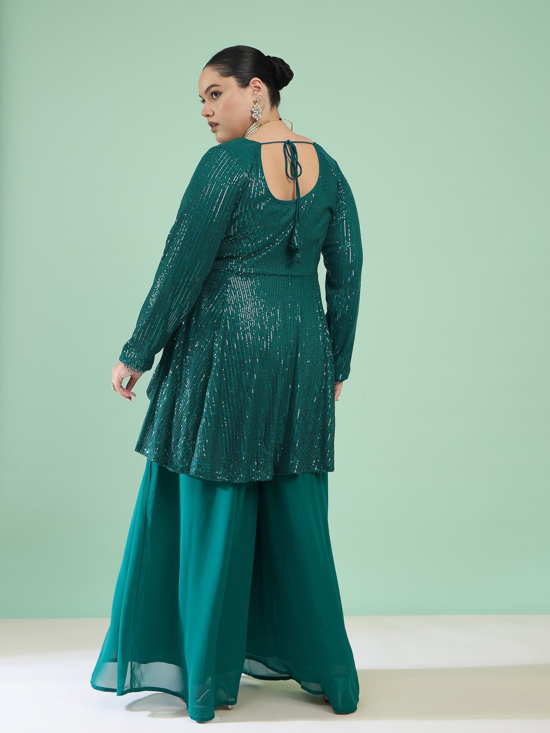 Women Green Sequin Full Sleeves Peplum Top With Flared Pants