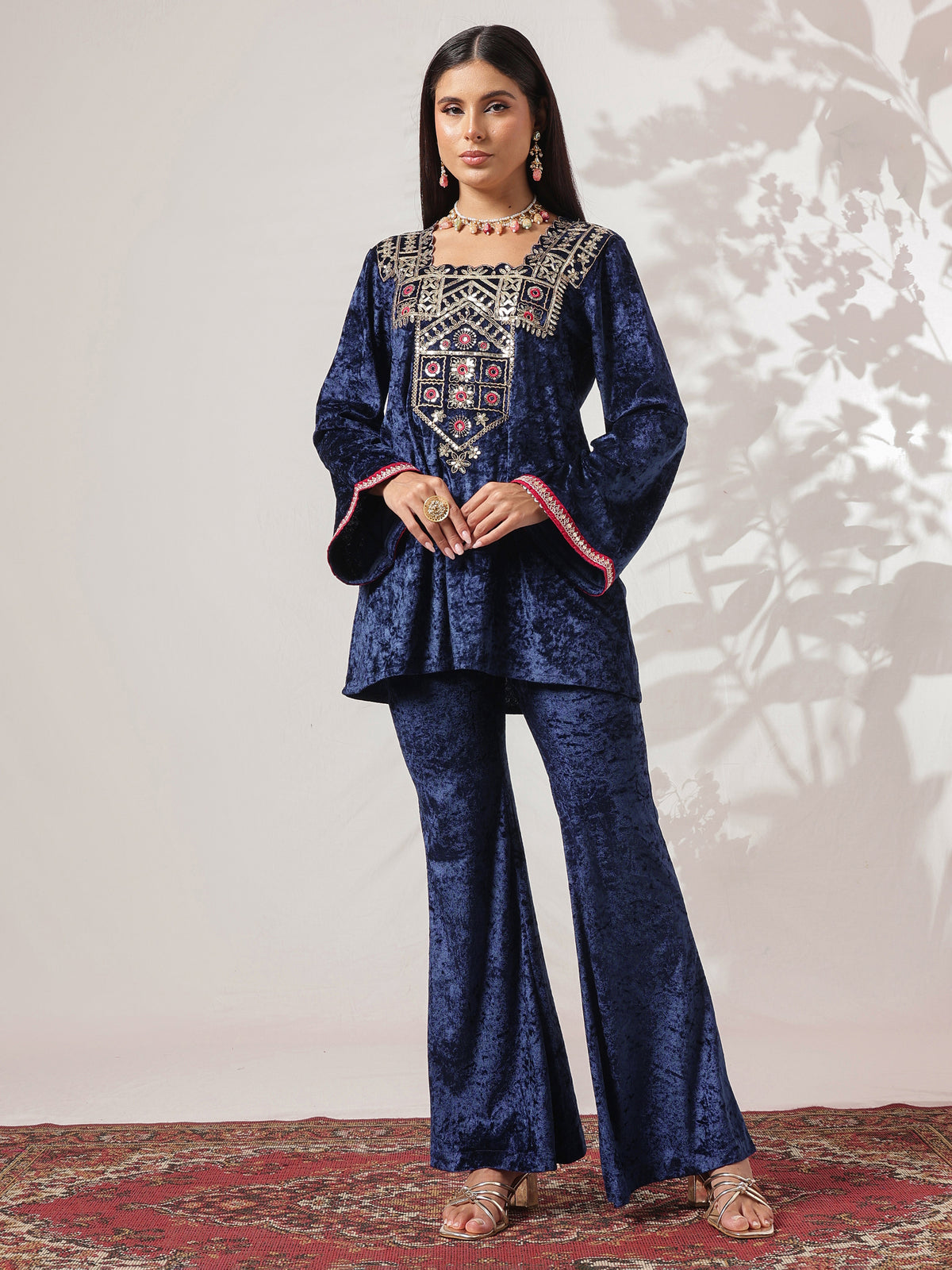 Navy Velvet Embroidered Short Kurta With Bell Bottom Pants-Shae by SASSAFRAS