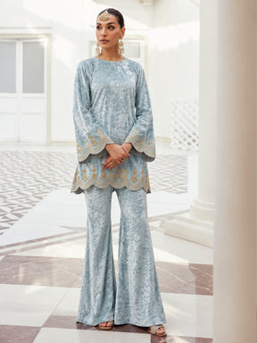 Powder Blue Velvet Hem Embroidered Short Kurta With Bell Bottom-Shae by SASSAFRAS