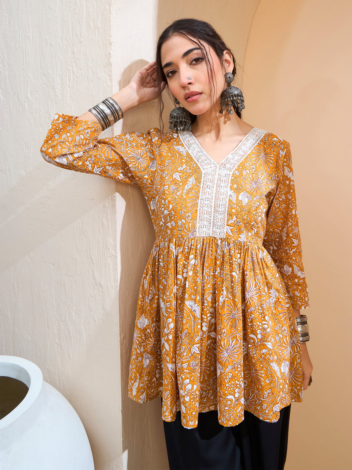 Yellow Floral Cambric V Neck Peplum Kurti -Shae by SASSAFRAS