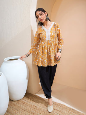 Yellow Floral Cambric V Neck Peplum Kurti -Shae by SASSAFRAS