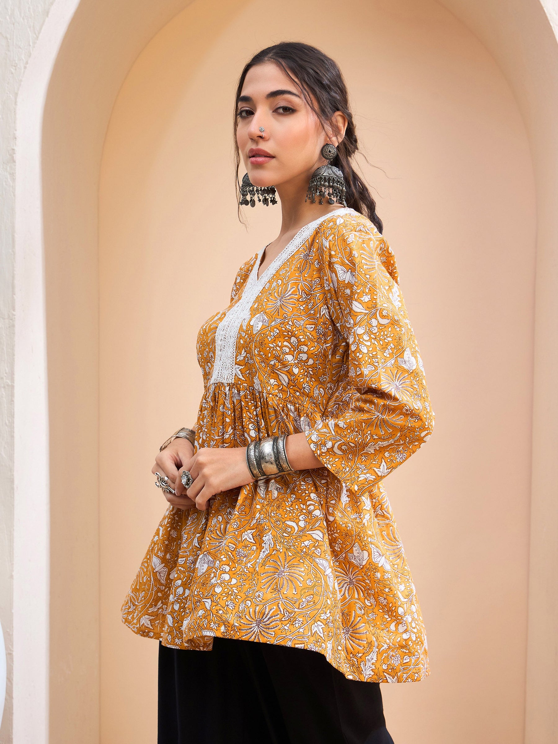 Yellow Floral Cambric V Neck Peplum Kurti -Shae by SASSAFRAS