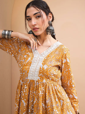 Yellow Floral Cambric V Neck Peplum Kurti -Shae by SASSAFRAS