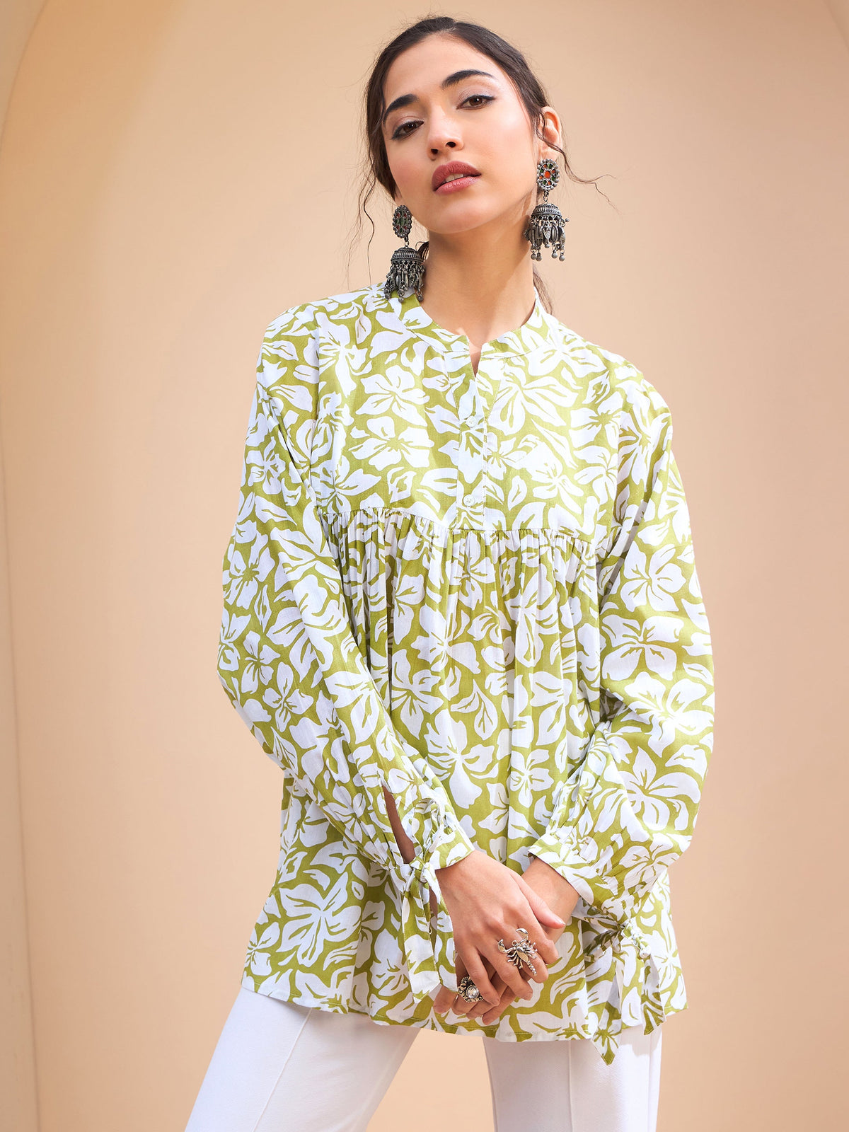 Green Floral Cambric Sleeves Knot Peplum Kurti-Shae by SASSAFRAS