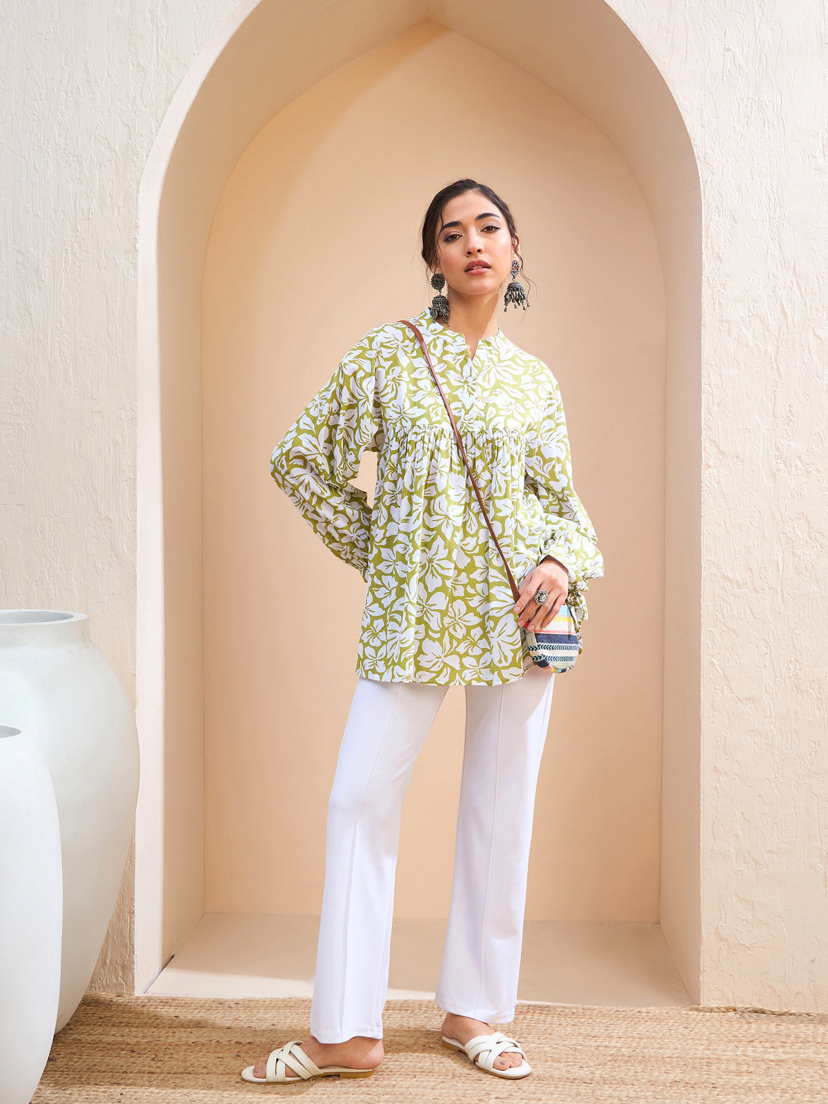Green Floral Cambric Sleeves Knot Peplum Kurti-Shae by SASSAFRAS