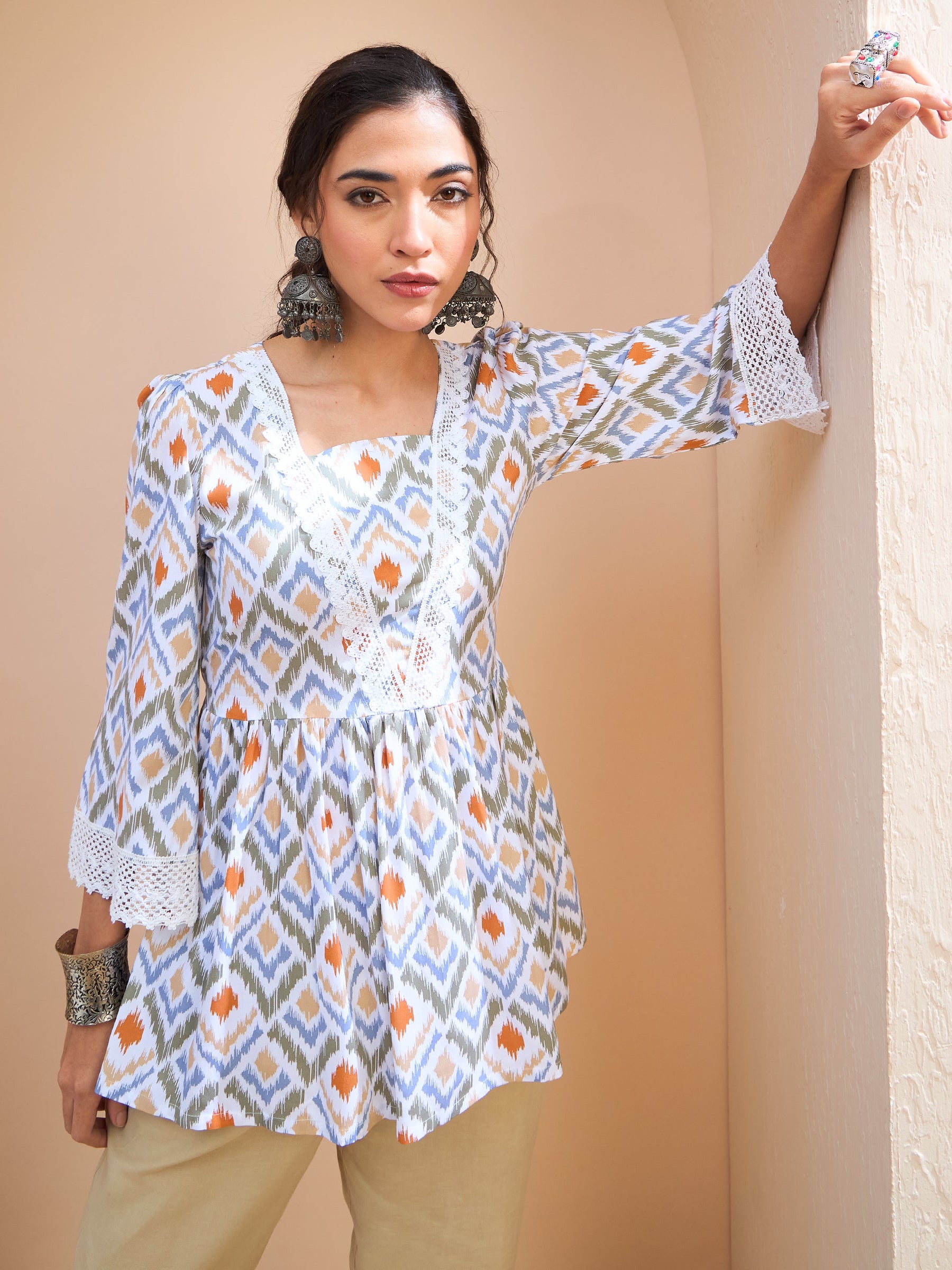 White Geometric Print Peplum Kurti-Shae by SASSAFRAS