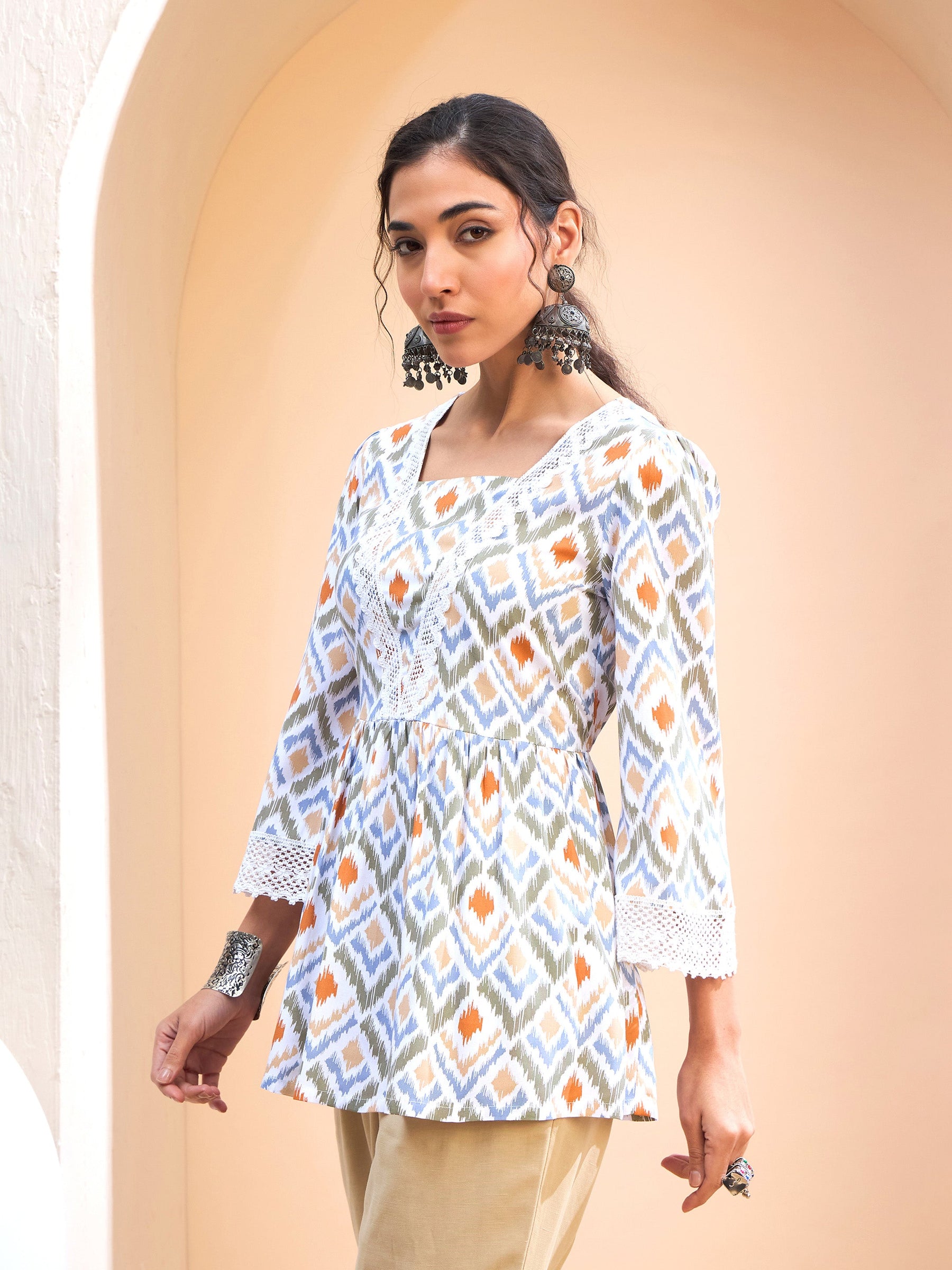 White Geometric Print Peplum Kurti-Shae by SASSAFRAS