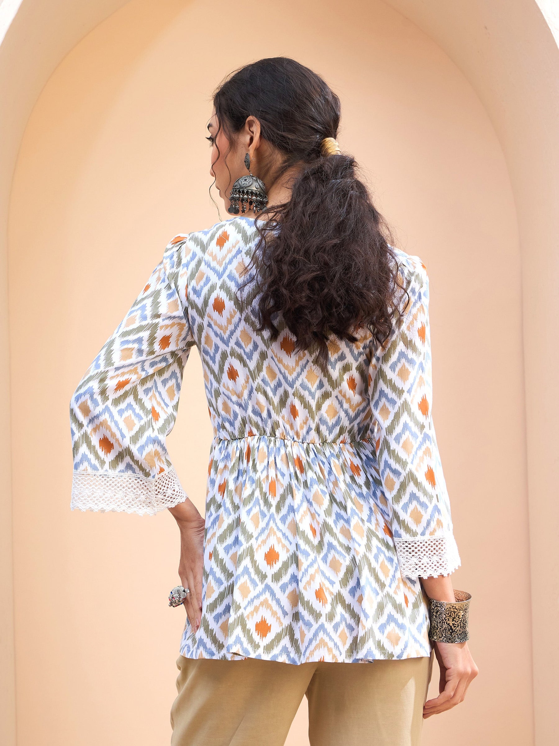 White Geometric Print Peplum Kurti-Shae by SASSAFRAS