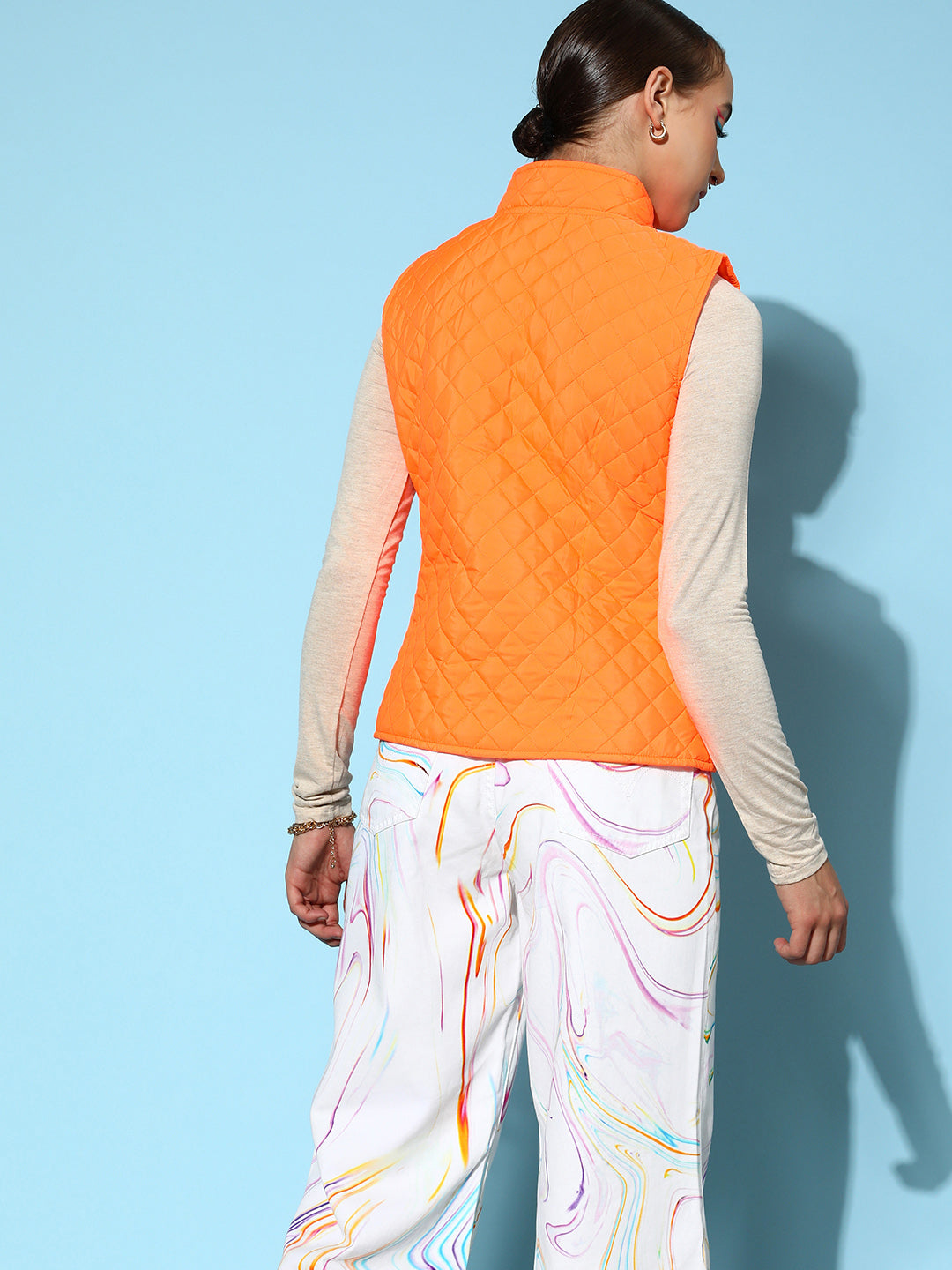 Orange sleeveless puffer outlet jacket