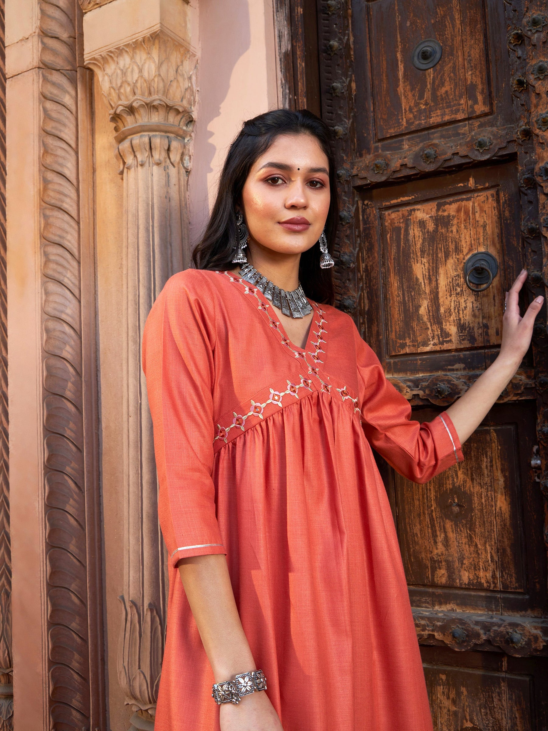 Rust Embroidered Slant Empire Seam Kurta-Shae by SASSAFRAS