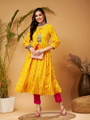 Yellow Floral Bishop Sleeves Tie-Up Kurta-Shae by SASSAFRAS