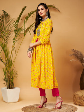 Yellow Floral Bishop Sleeves Tie-Up Kurta-Shae by SASSAFRAS